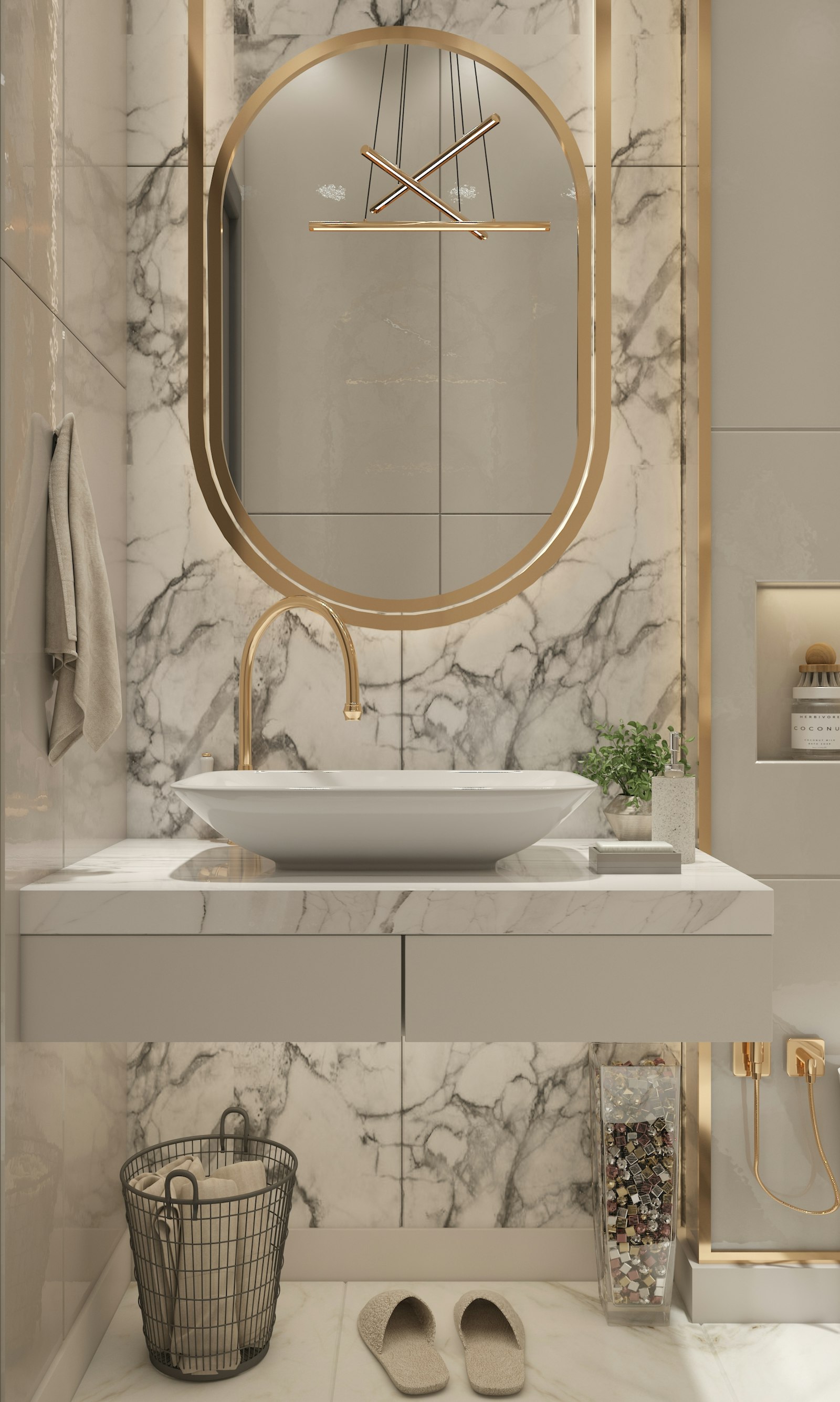 A marble bathroom vanity with a stone basin and a gold framed mirror